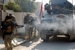 [Photo] Cảnh đấu súng ác liệt trên các con phố ở Đông Mosul