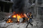 Cảnh hoang tàn ở thủ đô Syria sau những trận không kích