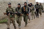 Phiến quân Syria chấp nhận thất bại, lũ lượt rút khỏi Đông Ghouta