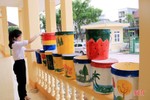 ĐVTN thị xã Kỳ Anh tái chế thùng sơn cũ thành chậu hoa tặng xã nông thôn mới